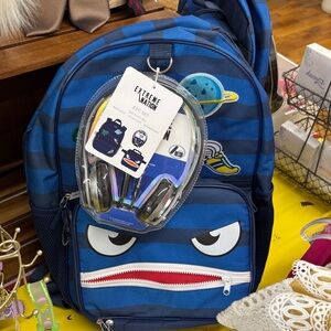 Macy’s Blue Striped Kids Backpack with Playful Monster Face